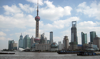 Why is the PRC showing signs of overheating despite slowing economic growth?