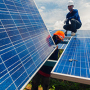Feed-in tariffs and loans for boosting private investment in renewable energy