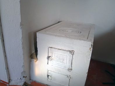 Photo 1: Coal-based cooking-heating stove in rural Kyrgyz Republic